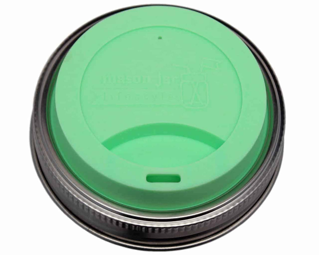 https://www.unpackedliving.com/cdn/shop/products/mason-jar-lifestyle-silicone-drinking-lid-stainless-steel-band-wide-mouth-mason-jars-mint-green_1024x1024.jpg?v=1637943864